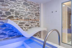 Πισίνα στο ή κοντά στο PomeGranate Suites