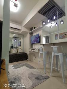 Postel nebo postele na pokoji v ubytování Olivia's Staycation Davao 1805