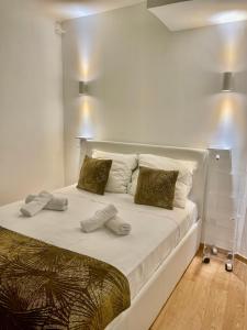 Katil atau katil-katil dalam bilik di Apartment Near Monaco & Rolex Masters +13 gambar