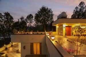 a view of a house with a balcony at De Borgo Hotel Ladakh by LexStays in Leh