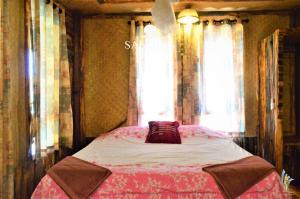 Letto o letti in una camera di Sangjun On Beach Resort