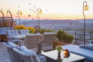 A seating area at Cappadocia Pegasos Cave Suite Hotel