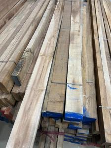 a pile of wooden lumber on a table at Hotel Jaipur In in Govardhan