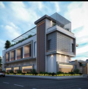 a large white building with a balcony on a street at Hotel Jaipur In in Govardhan