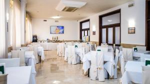 TV a/nebo společenská místnost v ubytování GH Hotel