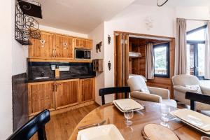 Η κουζίνα ή μικρή κουζίνα στο Les Mouflons - Immodreams - Avoriaz +6 φωτογραφίες