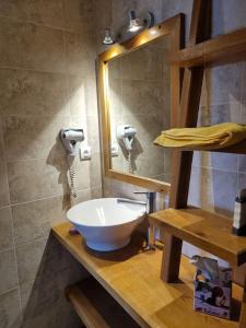Koupelna v ubytování Studio cosy - centre du village + 3 fotografie