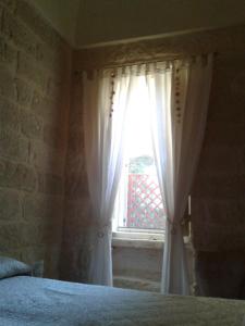 Postel nebo postele na pokoji v ubytování Le Calle
