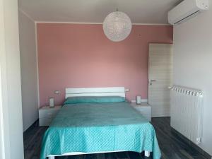 Letto o letti in una camera di Casa vacanze Rosalinda House di fronte al mare di Palermo