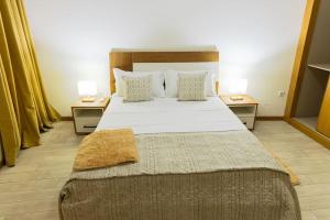 Ένα ή περισσότερα κρεβάτια σε δωμάτιο στο Jet Ap & Car 12 - AC