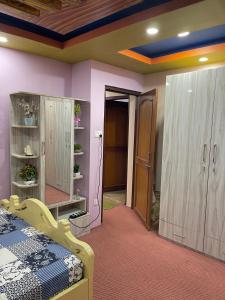 Postel nebo postele na pokoji v ubytování Raniban Serenity Suite