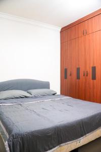 Postel nebo postele na pokoji v ubytování Cozy Corner - Bandar Baru Uda