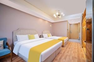 Letto o letti in una camera di 寓米公寓(琶洲会展中心广州塔店)