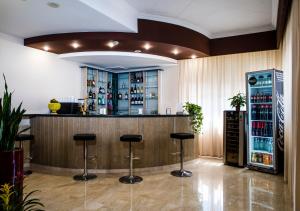 Lounge nebo bar v ubytování GH Hotel
