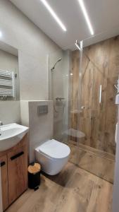 Koupelna v ubytování Wrzosowe Wzgórze 5 - Mały Apartament z Wanną