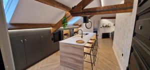 Kuchyň nebo kuchyňský kout v ubytování La Mutua Gijón - Espectacular 3 habitaciones Puerto-Playa - Wifi - VUT-4995-AS