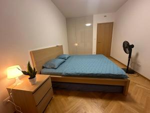 Postel nebo postele na pokoji v ubytování Smichov city Apartments