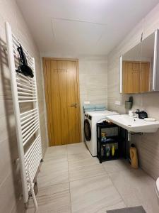Kuchyň nebo kuchyňský kout v ubytování Smichov city Apartments
