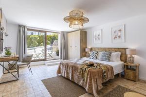 Postel nebo postele na pokoji v ubytování Villa Pakatoa + 37 fotografií
