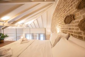 Krevet ili kreveti u jedinici u okviru objekta Aletheia Heritage Properties +35 fotografija