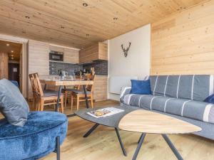 Posezení v ubytování Charmant appartement 4 pers. 40m², style montagne moderne, proche commodités aux Belleville - FR-1-545-47