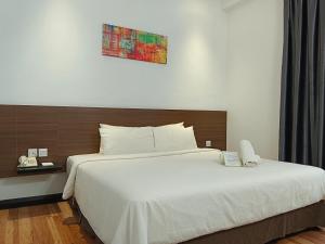 Katil atau katil-katil dalam bilik di Fuller Hotel +16 gambar