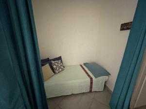 En eller flere senge i et værelse på Residence Calamaiore