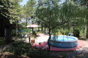 Piscina a Le Conifere o a prop