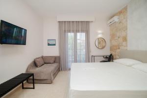 Postel nebo postele na pokoji v ubytování Venia Apartments