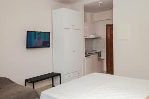 Kuchyň nebo kuchyňský kout v ubytování Venia Apartments