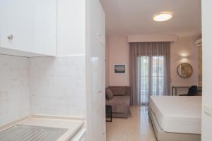 Postel nebo postele na pokoji v ubytování Venia Apartments