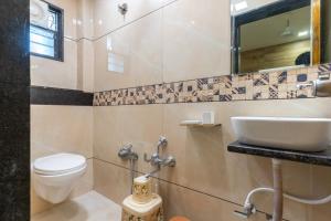 Koupelna v ubytování Hotel Noble Inn, Ahmedabad