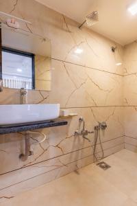Koupelna v ubytování Hotel Noble Inn, Ahmedabad