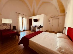 Postel nebo postele na pokoji v ubytování B&B Porta Grande
