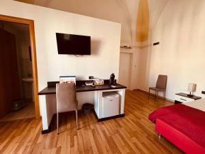 TV a/nebo společenská místnost v ubytování B&B Porta Grande