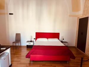 Postel nebo postele na pokoji v ubytování B&B Porta Grande
