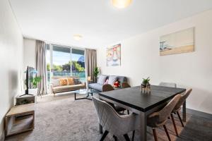 Μια τηλεόραση ή/και κέντρο ψυχαγωγίας στο CBD 3BR Apt & Darling Harbour&Chinatown-2 mins walk