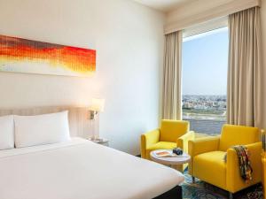 Posezení v ubytování Ibis Styles Dragon Mart Dubai