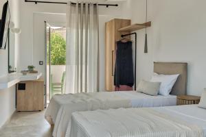 Letto o letti in una camera di Ecoresort Hotel Zefyros