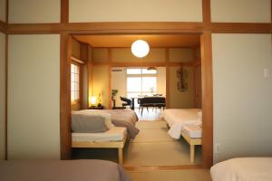 Gyominsou 魚眠荘 #GS1客房内的一张或多张床位