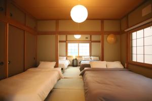 Gyominsou 魚眠荘 #GS1客房内的一张或多张床位