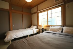 Gyominsou 魚眠荘 #GS1客房内的一张或多张床位