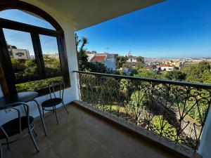 Un balcón o terraza en Riad Dar Achaach