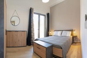 Ένα ή περισσότερα κρεβάτια σε δωμάτιο στο Casa Noma nel cuore del Salento