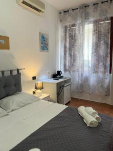 Gallery image of Il Canarino affittacamere in La Caletta +41 photos