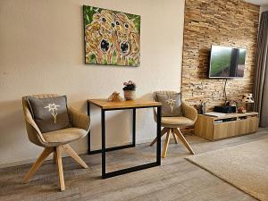 Posezení v ubytování Ferienwohnung Almwiese