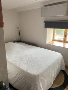 Postel nebo postele na pokoji v ubytování La Marelle