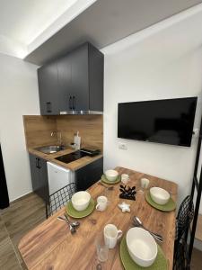 Kuchyň nebo kuchyňský kout v ubytování IO's Apartments