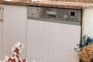 a stove in a kitchen with a counter top at Qbra House 2BR Central Apt Walk to Landmarks in Istanbul