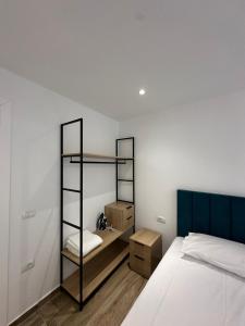 Postel nebo postele na pokoji v ubytování IO's Apartments